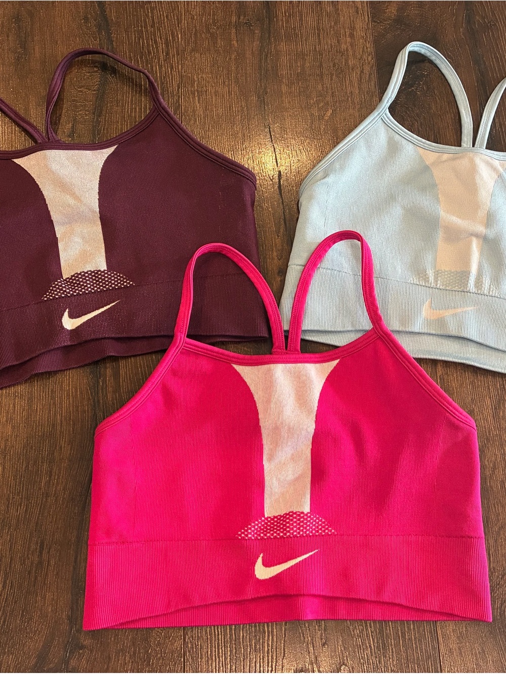 Nike Girls lot of 3 sports bras: Bright Pink, light blue and maroon
